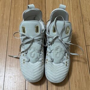 Nike Sneakers in Light Gray with Gold Highlights